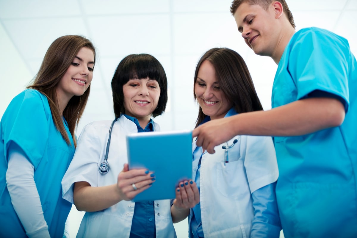 Healthcare team collaborating on patient care